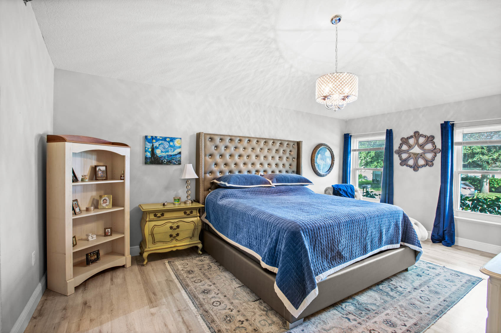 primary bedroom with blue comforter